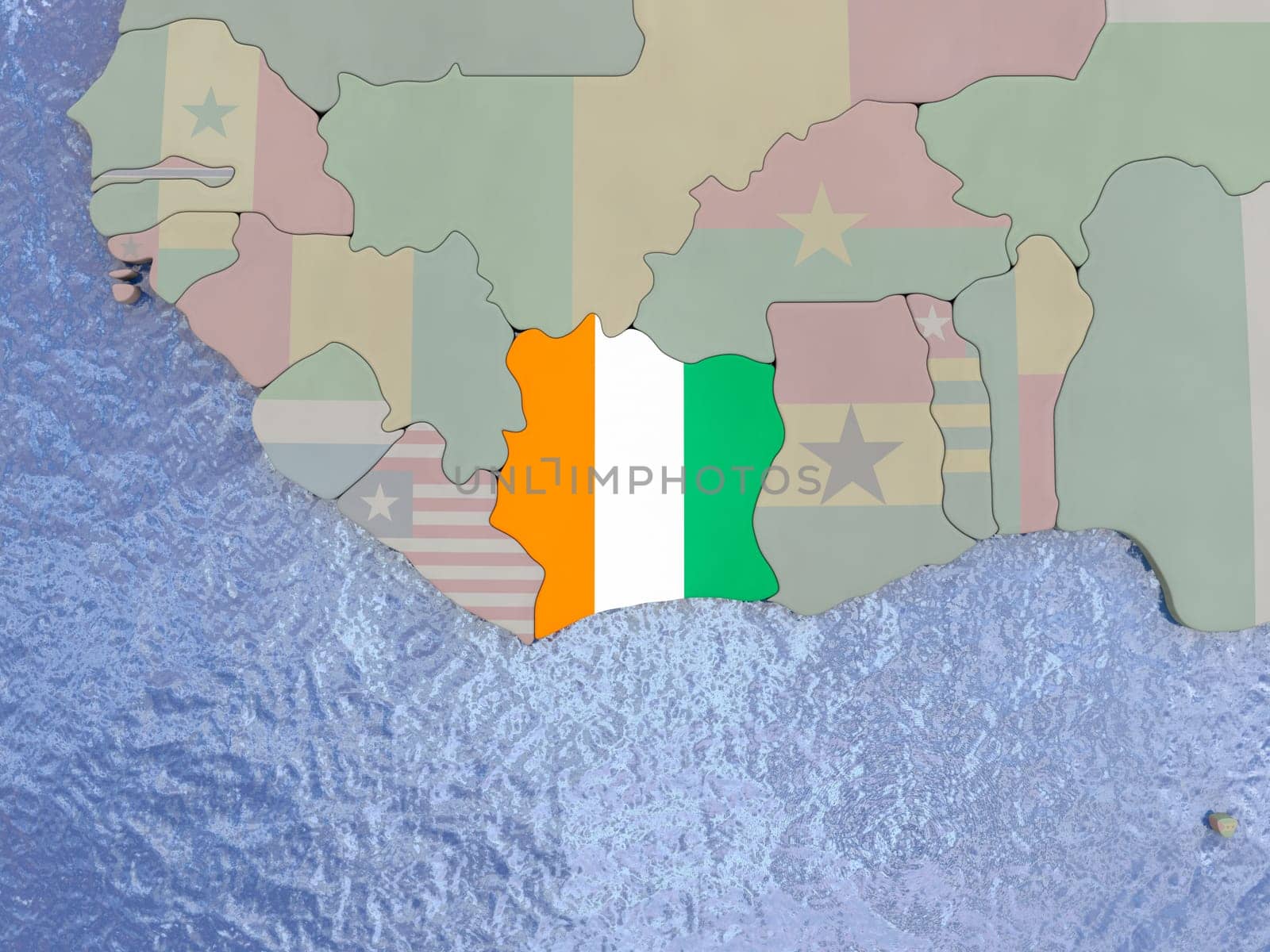 Map of Ivory Coast with national flag on political globe with realistic water. 3D illustration