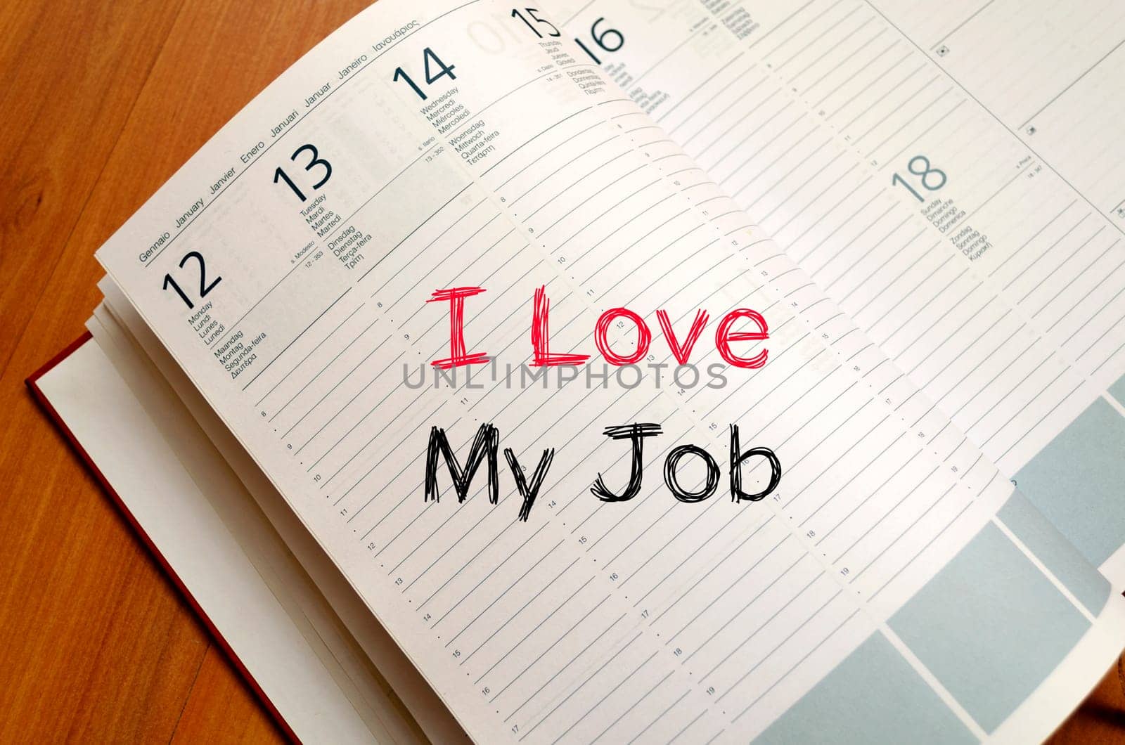 I love my job text concept write on notebook