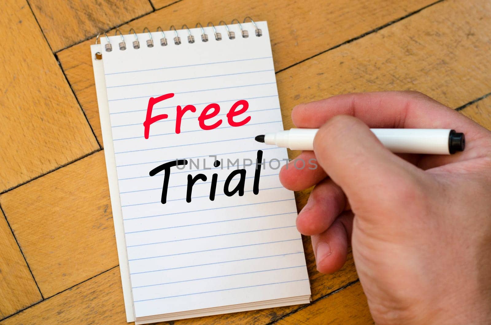 Free trial text concept write on notebook