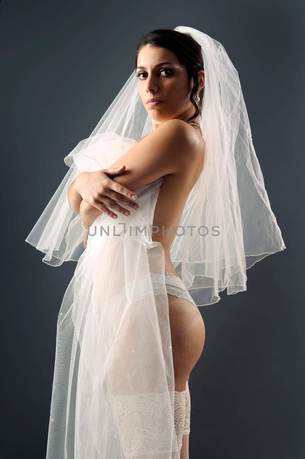 Beautiful bride posing in lingerie