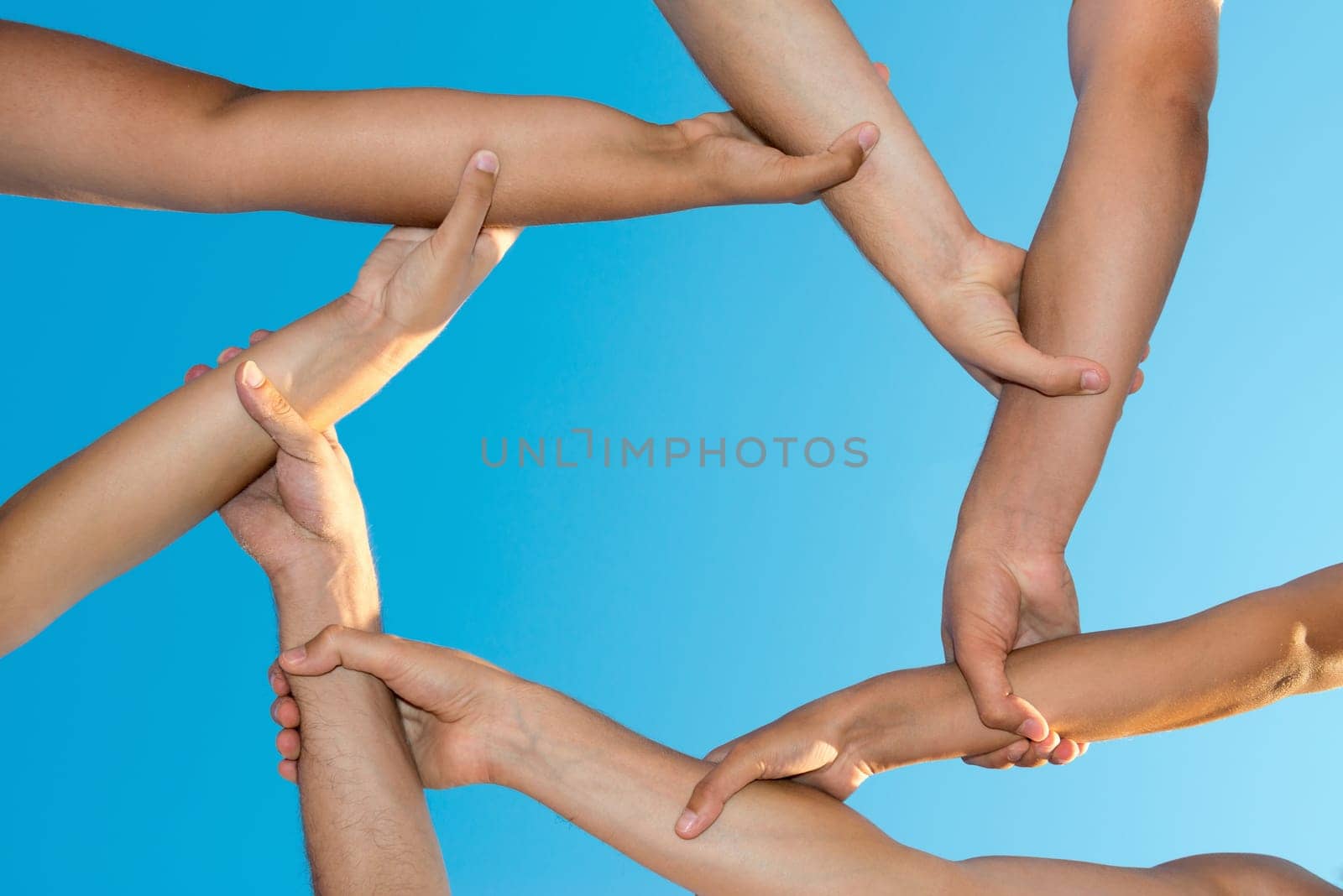 Hands forming an unbreakable chain