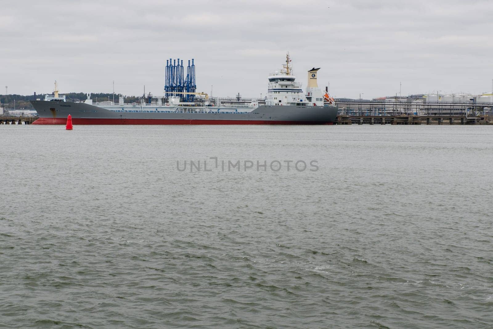 one big ship in Gothenburg harbour loiding the ship with oil