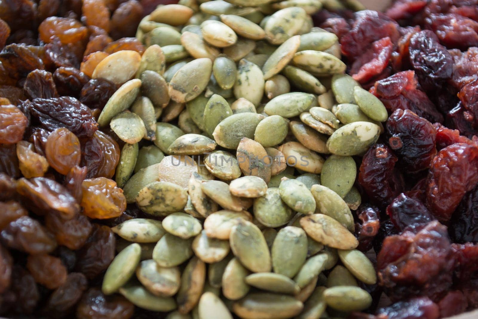 Dry fruit with pumpkin seed in the wooden bowl