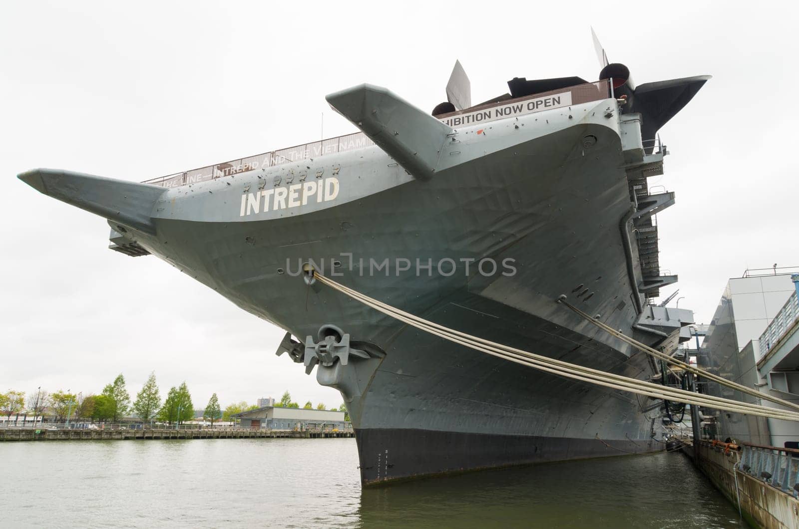 NEW YORK CITY - MAY 1, 2016: Low angle view of the uss intrepid aircraft carrier in Manhattan. The ship is part of the Intrepid Sea, Air & Space Museum and was build in 1943