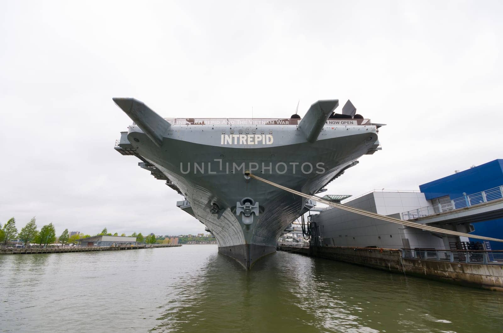 NEW YORK CITY - MAY 1, 2016: Low angle view of the uss intrepid aircraft carrier in Manhattan. The ship is part of the Intrepid Sea, Air & Space Museum and was build in 1943