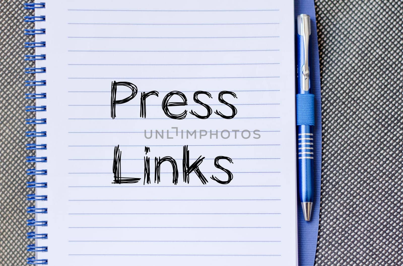 Press links text concept write on notebook