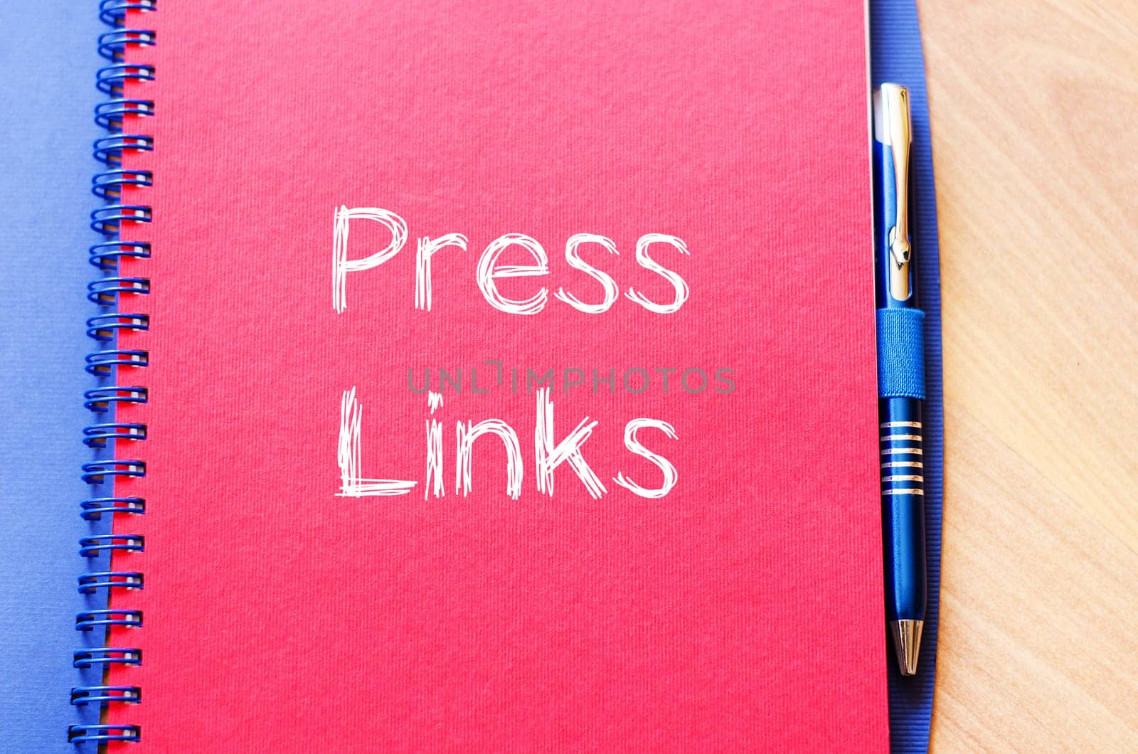 Press links text concept write on notebook