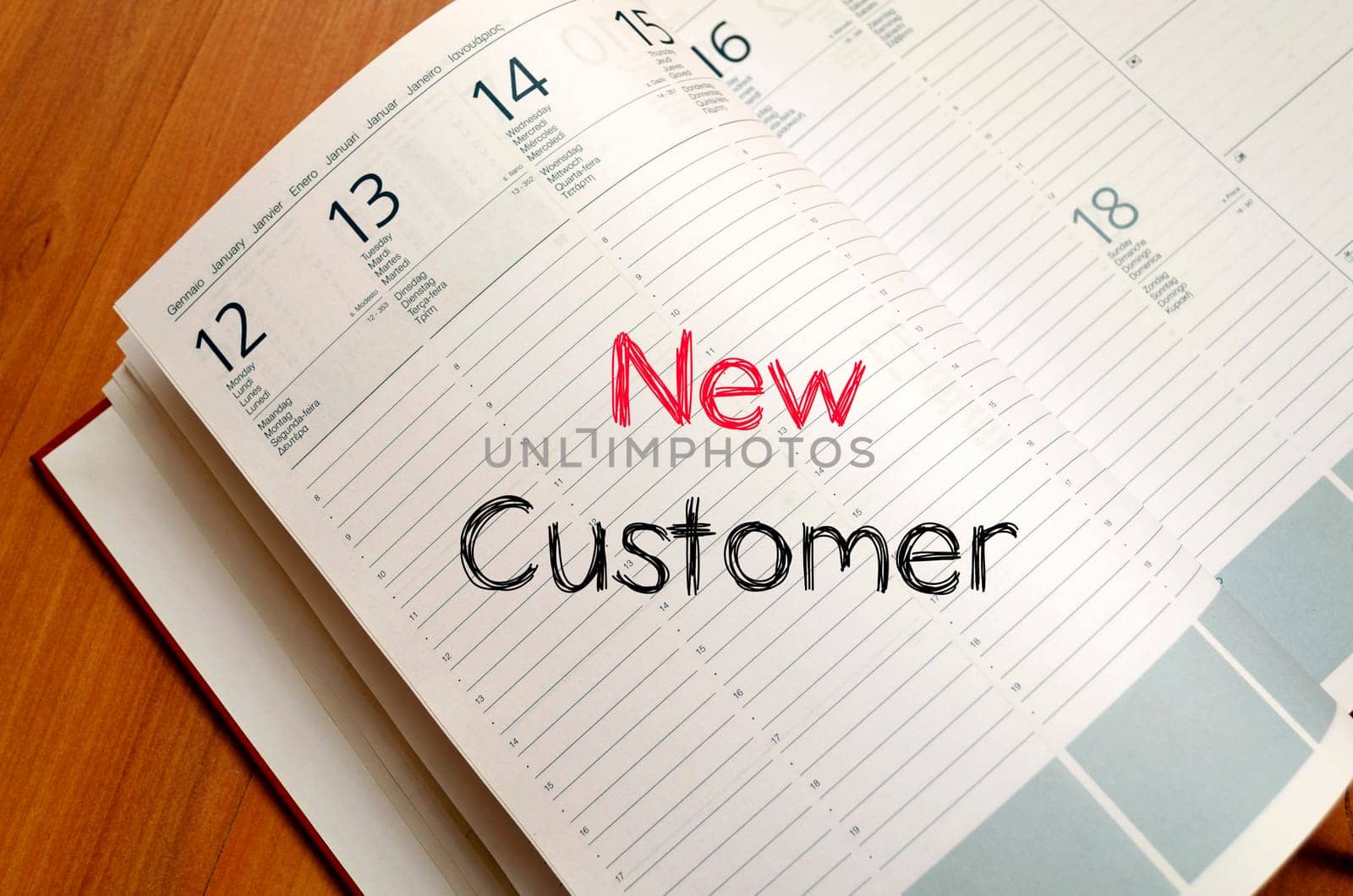 New customer text concept write on notebook