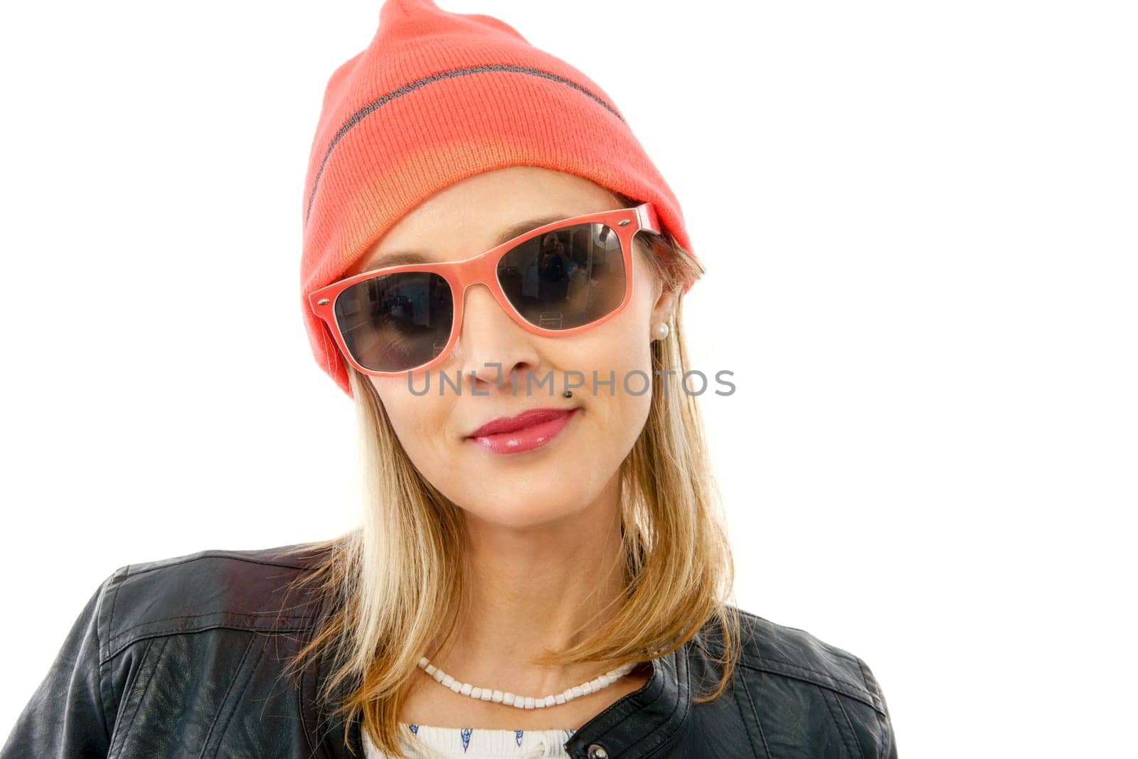 Portrait of a beautiful blond middle-aged woman with sunglasses