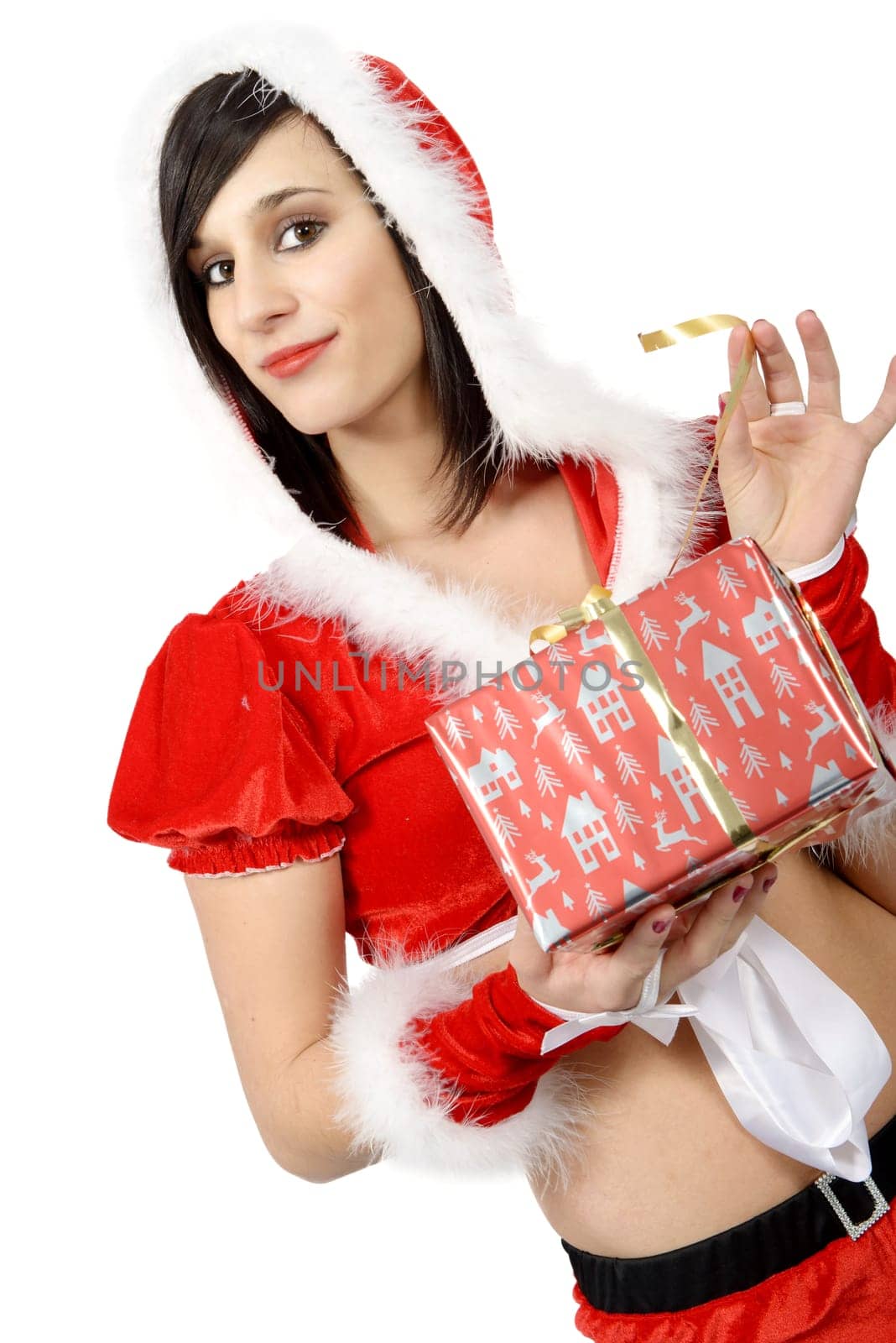 beautiful young woman in santa claus costume with gift