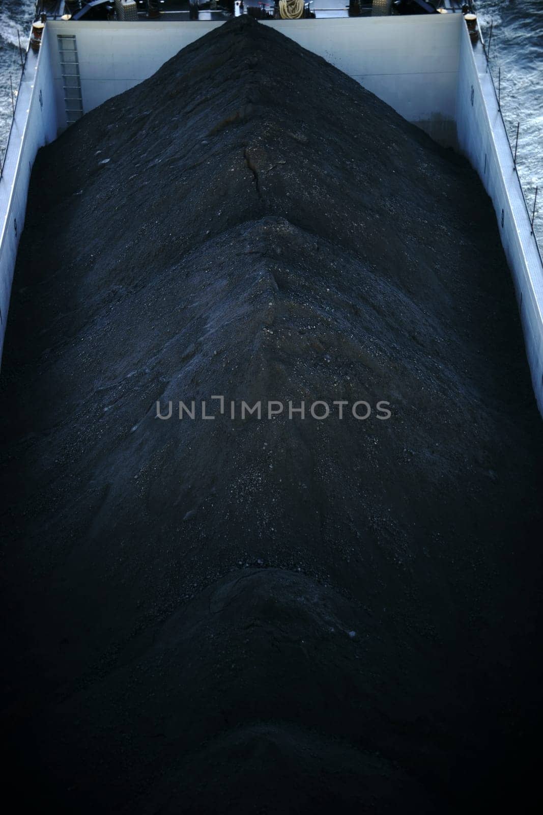 The upper deck of a transport ship with loaded coal.