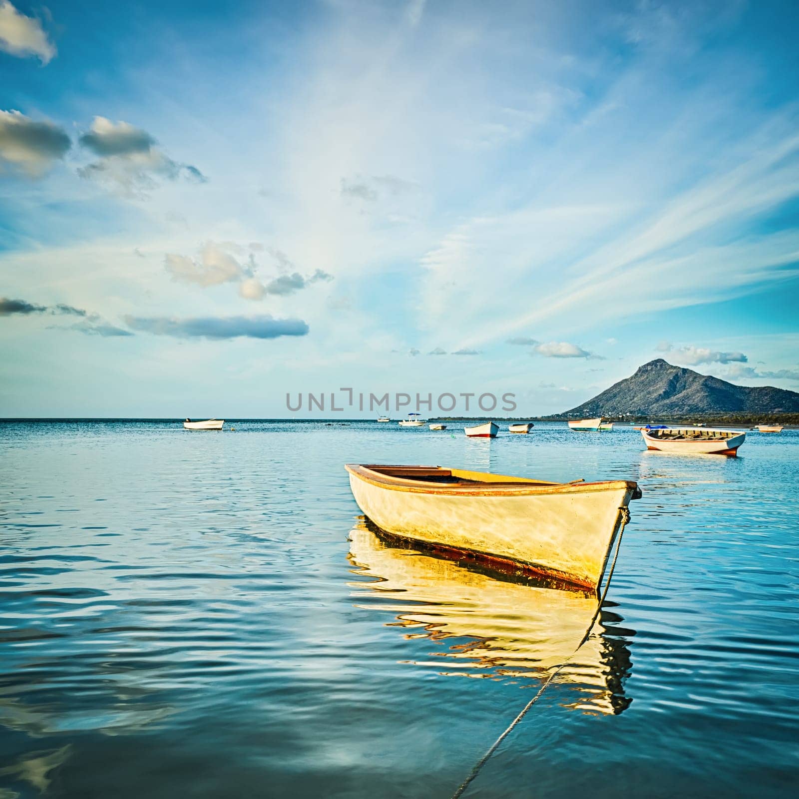 Fishing boat at sunset time. Mauritius