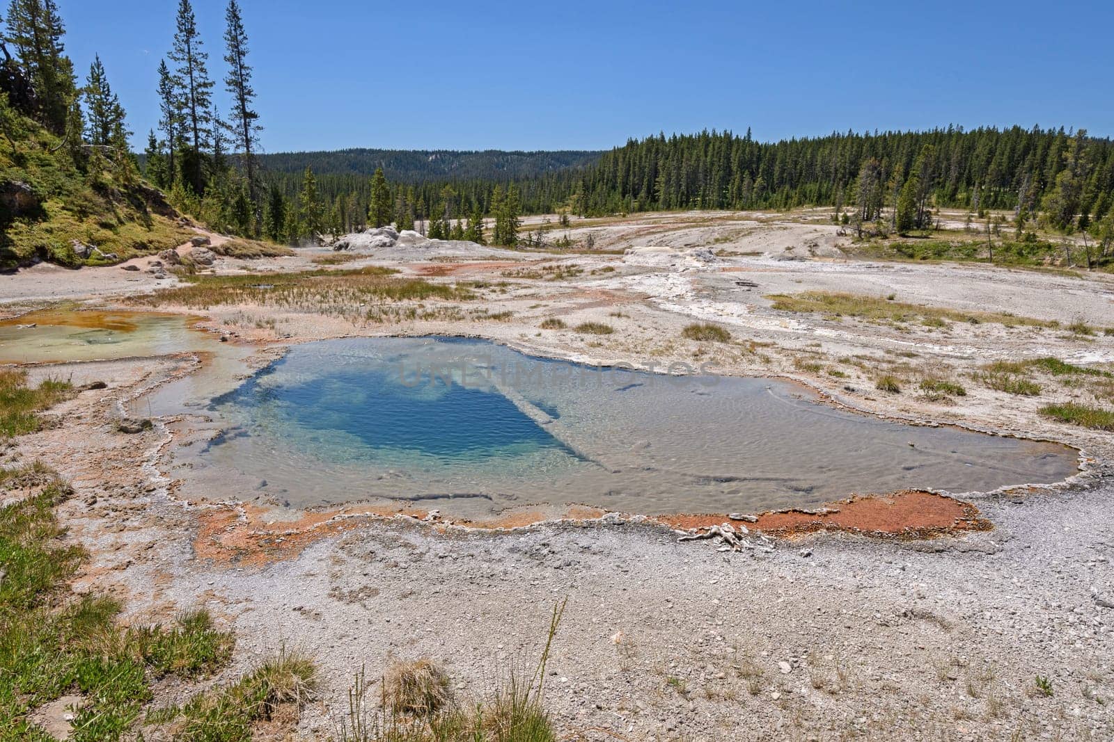 Colorful Pool in the Backcountry of the Shoshone Thermal Area in Yellowstone National park in Wyoming