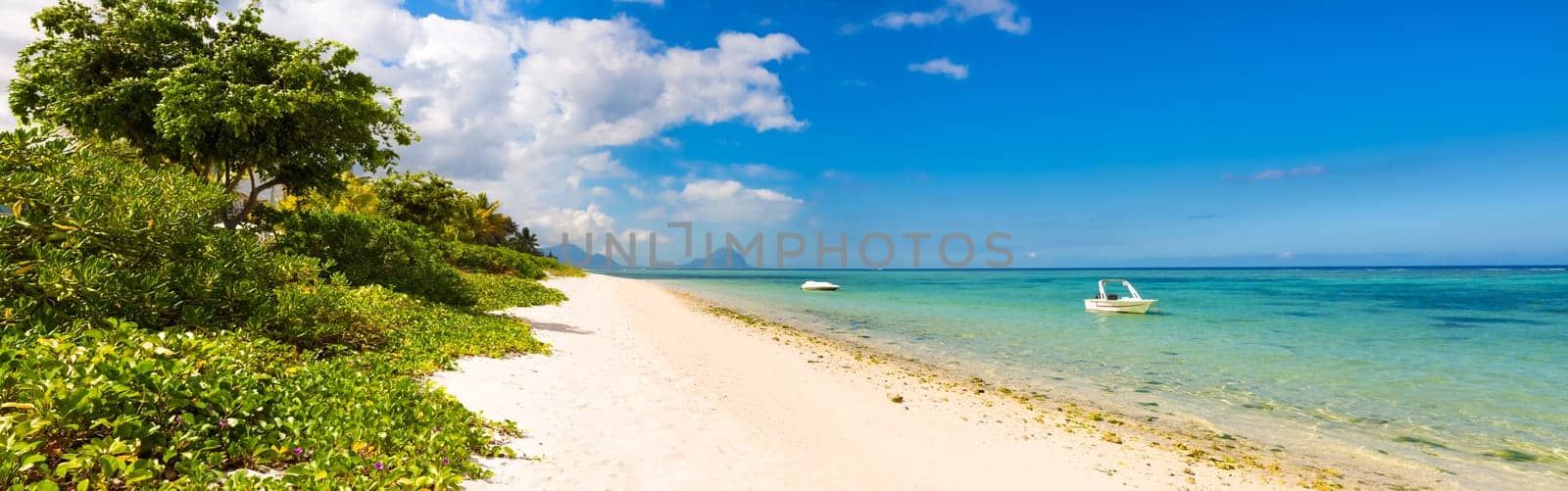 Sandy tropical Wolmar beach at sunny day. Panorama. Mauritius