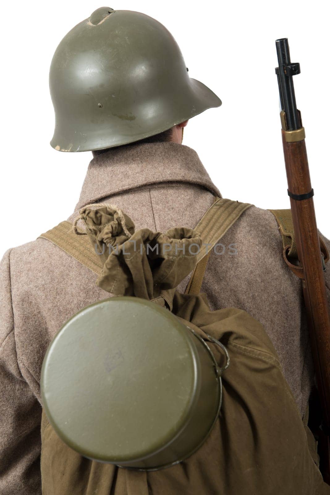 young Soviet soldier with winter uniform, back view, isolated on the white background
