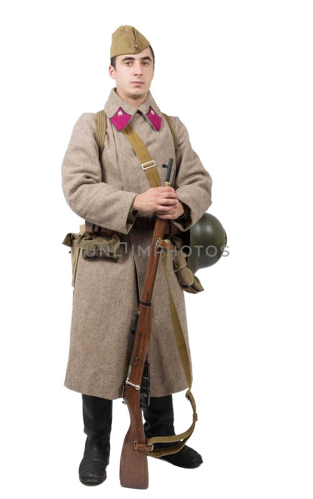 young Soviet soldier with winter uniform isolated on the white background