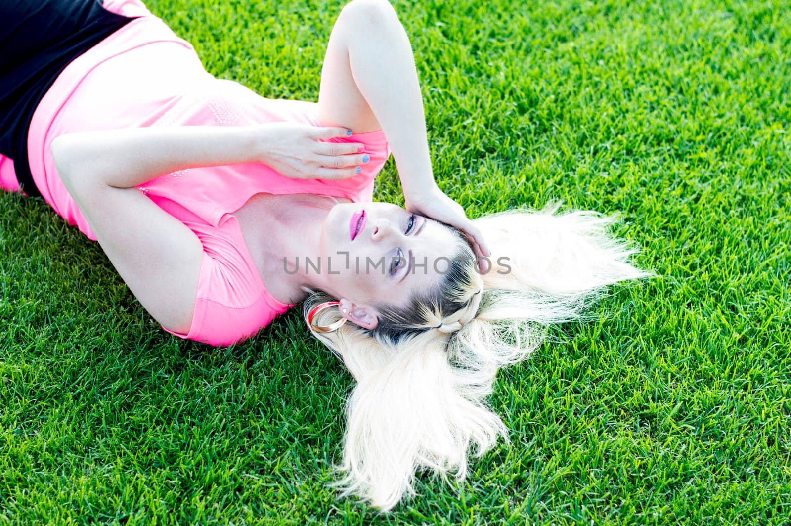 the blonde with a flowing hair on the football field, a subject beautiful women, sport, events