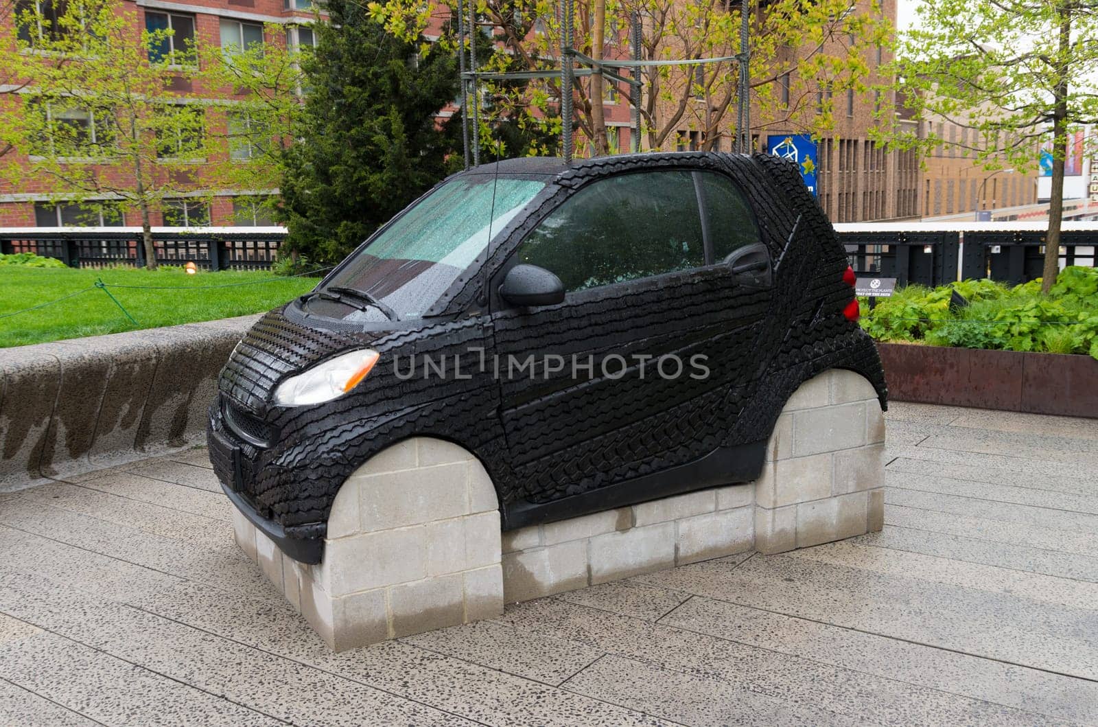 NEW YORK CITY - MAY 1, 2016: contemporary public art of a small car at the High Line Park in new york