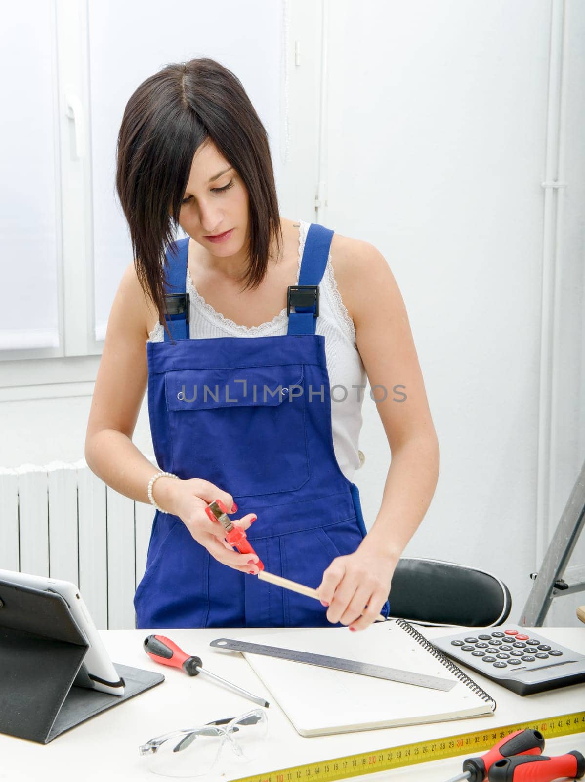 portrait of young brunette woman apprentice