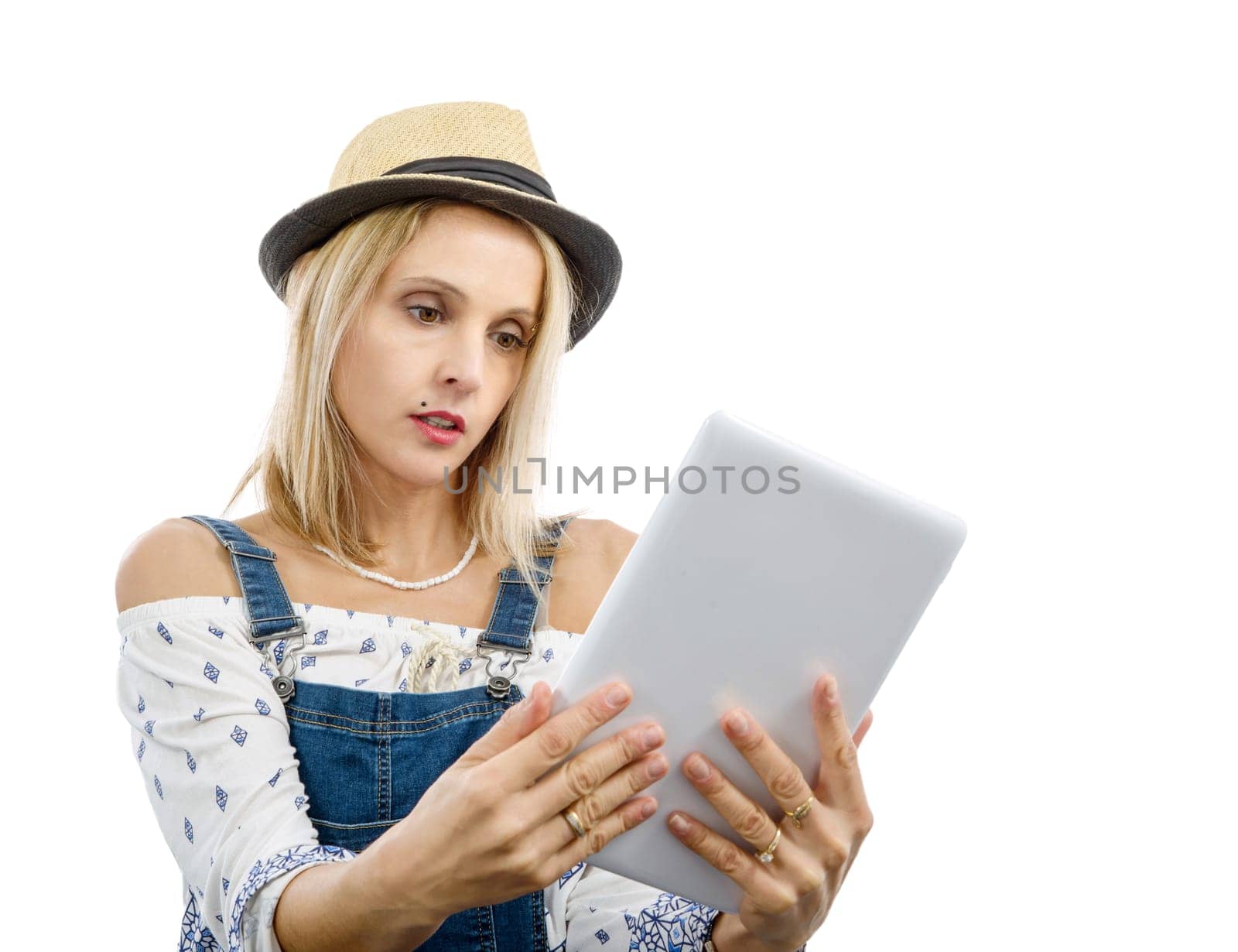 beautiful blond middle-aged woman with tablet computer