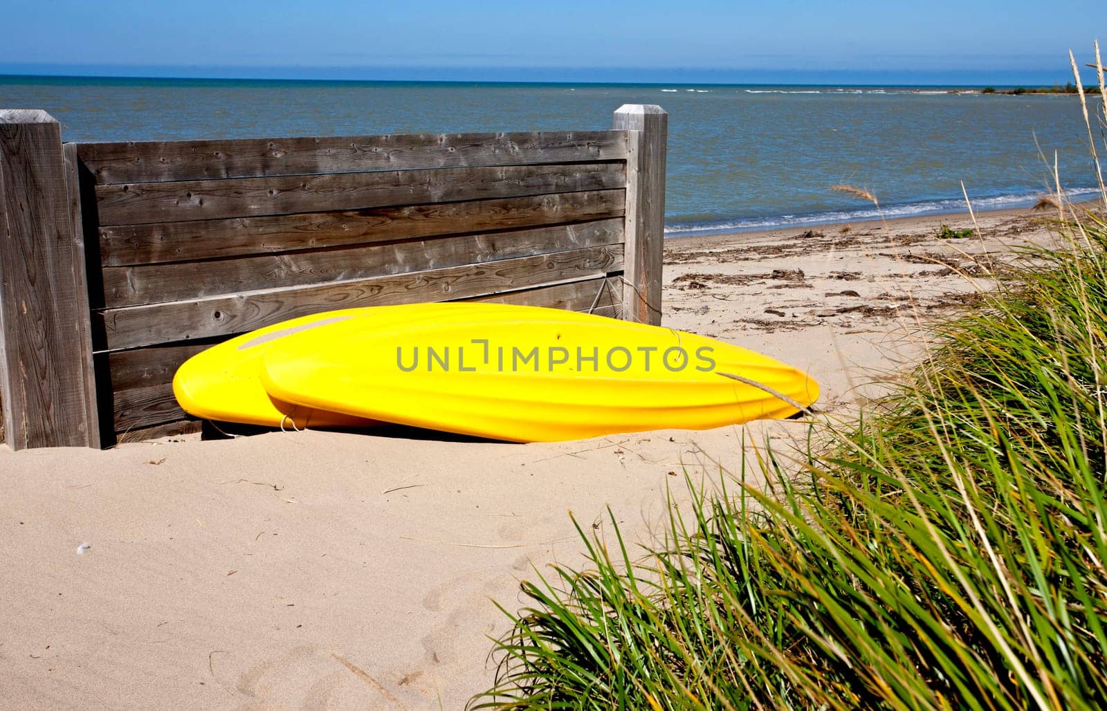 Yellow Kayak on shore on Lake Huron Ontario