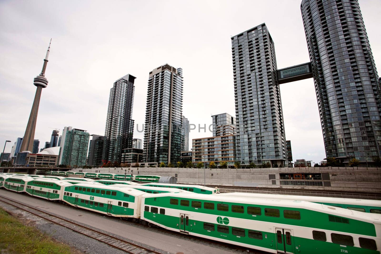 Daytime Photos of Toronto Ontario buildings downtown go train and tracks