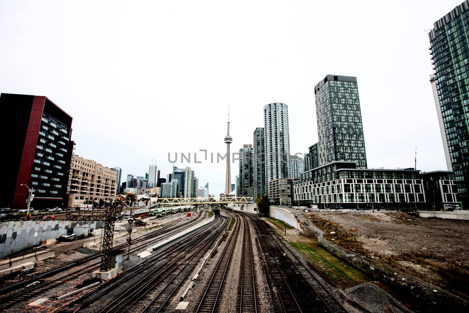 Daytime Photos of Toronto Ontario buildings downtown go train and tracks
