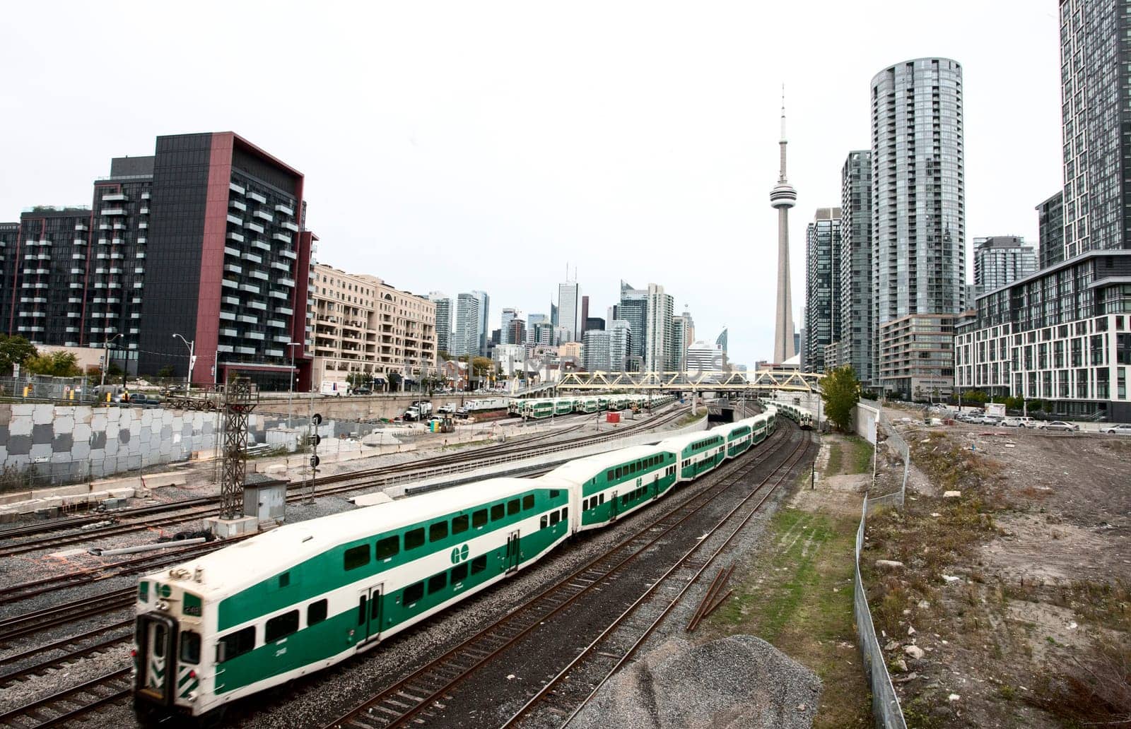 Daytime Photos of Toronto Ontario buildings downtown go train and tracks
