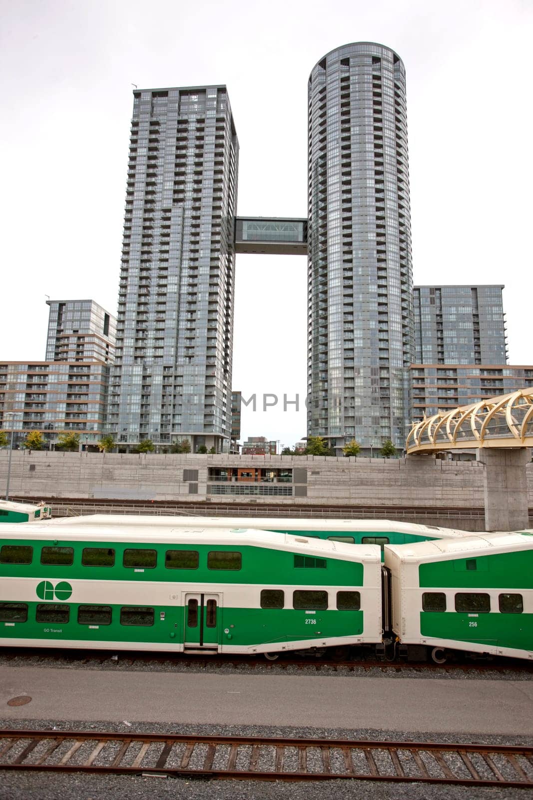 Daytime Photos of Toronto Ontario buildings downtown go train and tracks