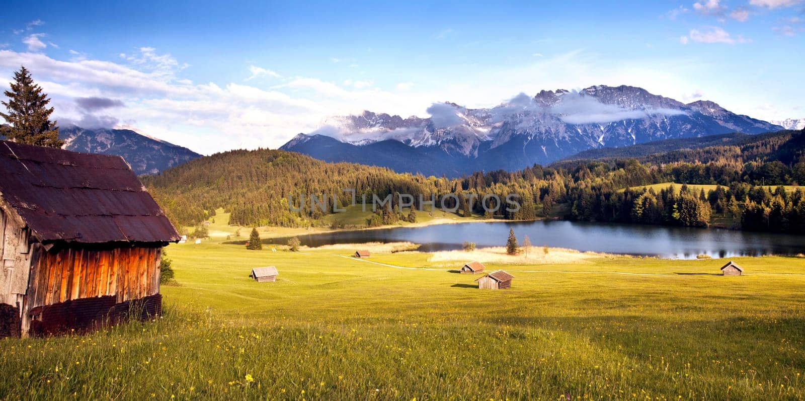 Wooden hut on Lake Gerold see with Karwendel