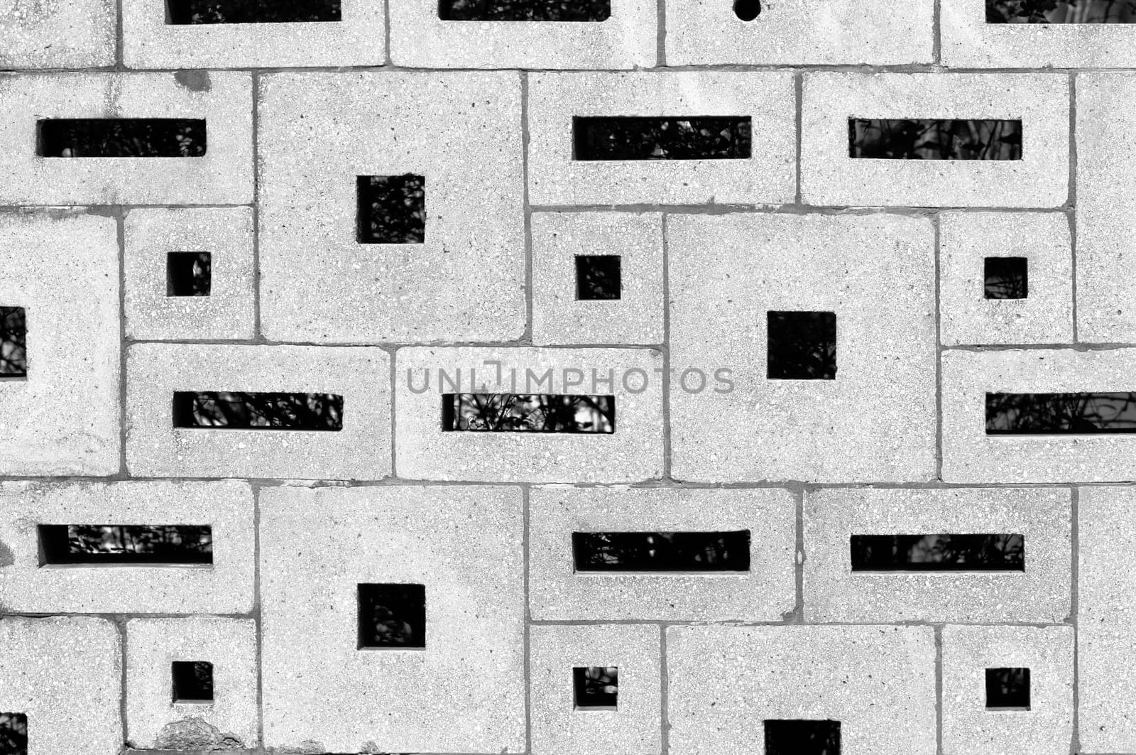 Concrete wall surface built from various rectangular blocks horizontal
