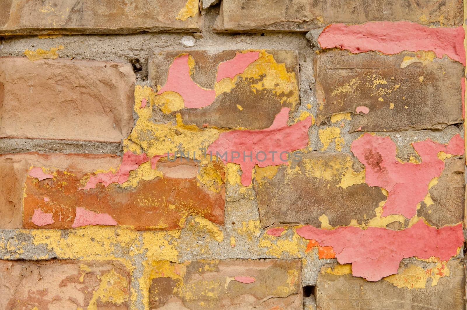 Old painted brick wall background weathered