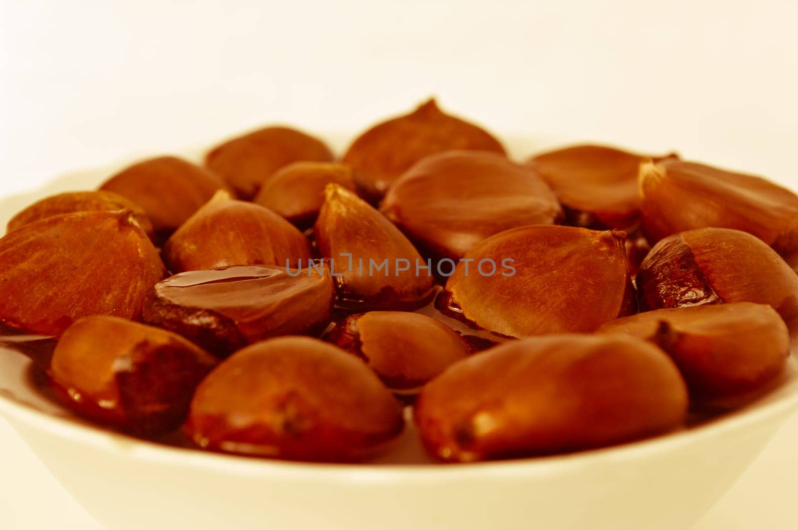 Fresh edible chestnuts soak in water