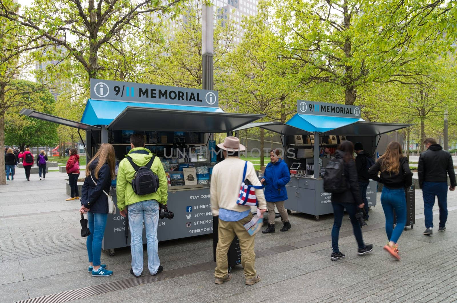 NEW YORK - MAY 2, 2016: Unknown tourists at an information stand at ground zero