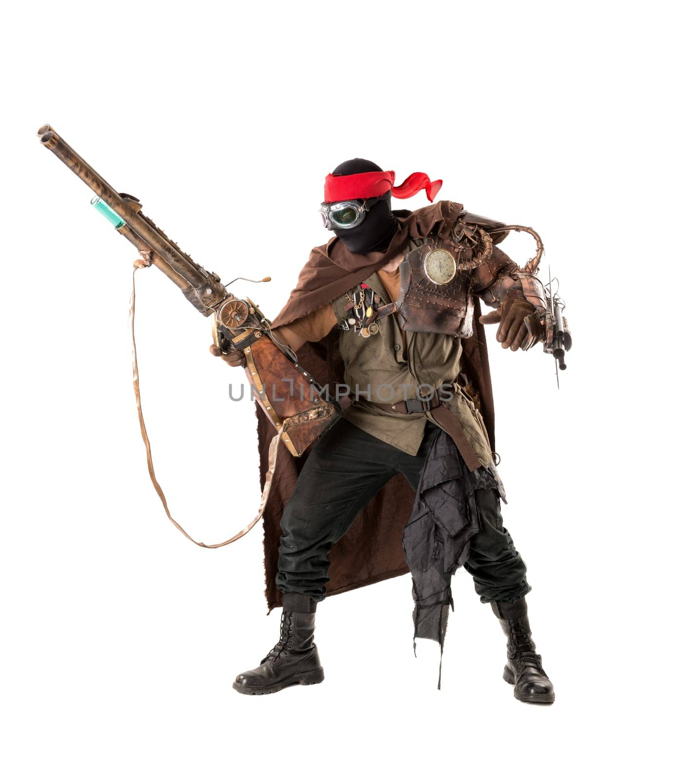 Futuristic soldier posing with gun and armor isolated in white