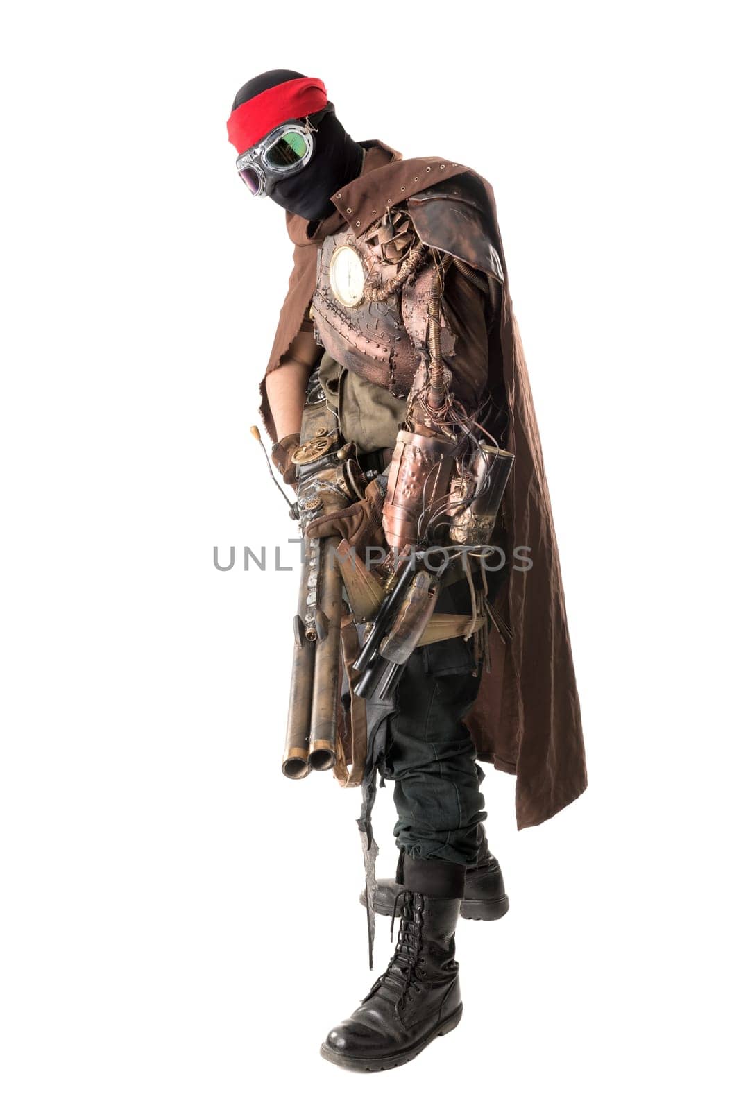 Futuristic soldier posing with gun and armor isolated in white