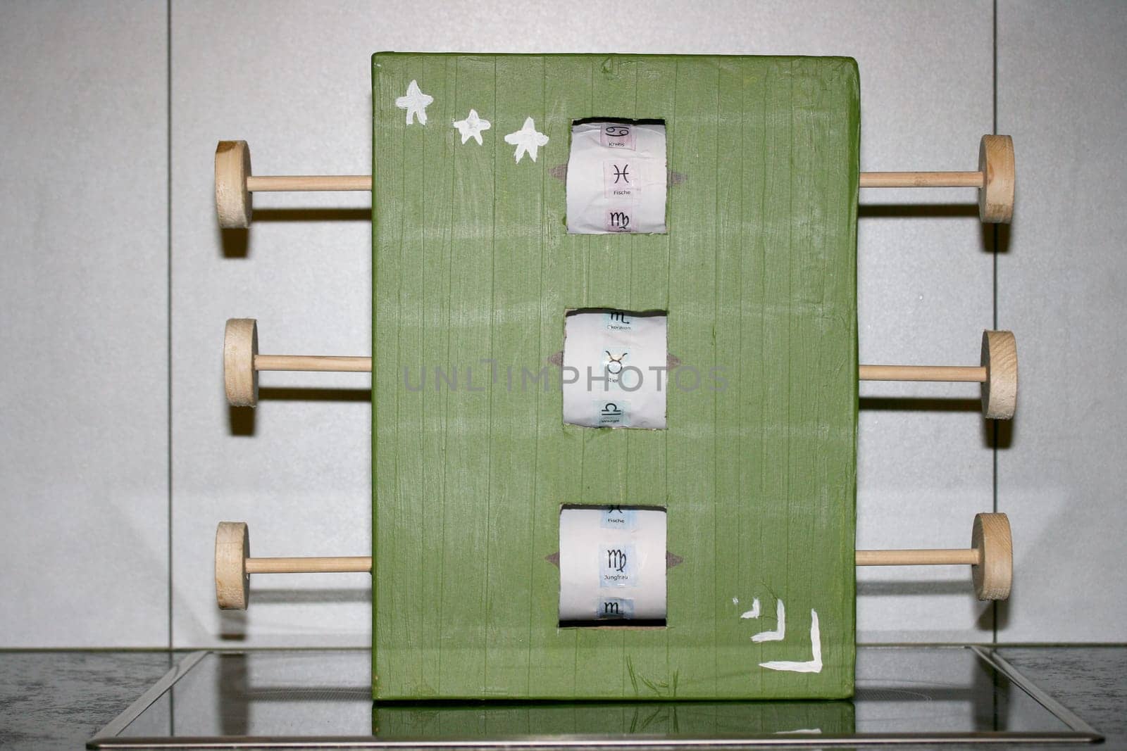 Slot machine made of wood and cardboard.