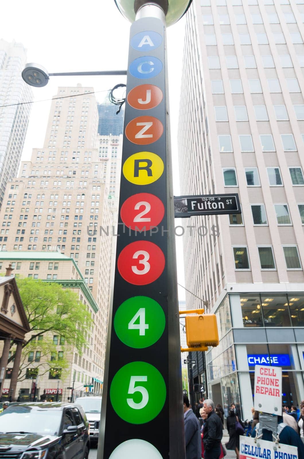 NEW YORK - MAY 2, 2016: Information pole about different subway lines on Fulton Street