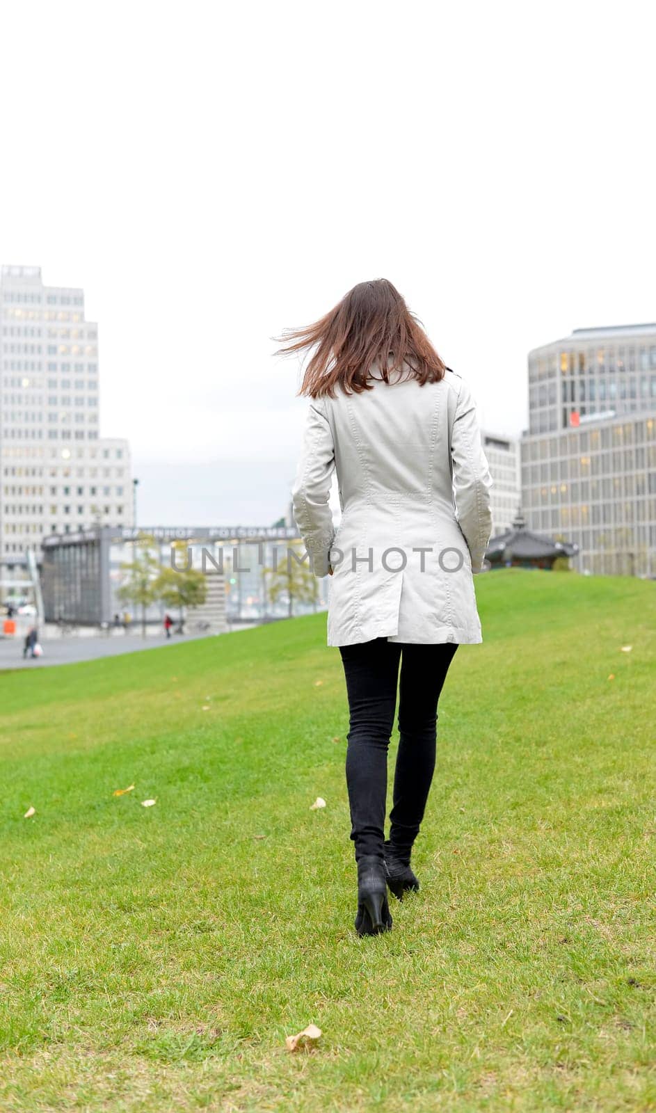 Businesswoman in the city,rear view