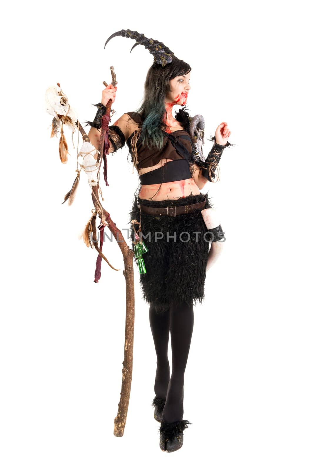 Faun sorceress with big horns and blood isolated in white