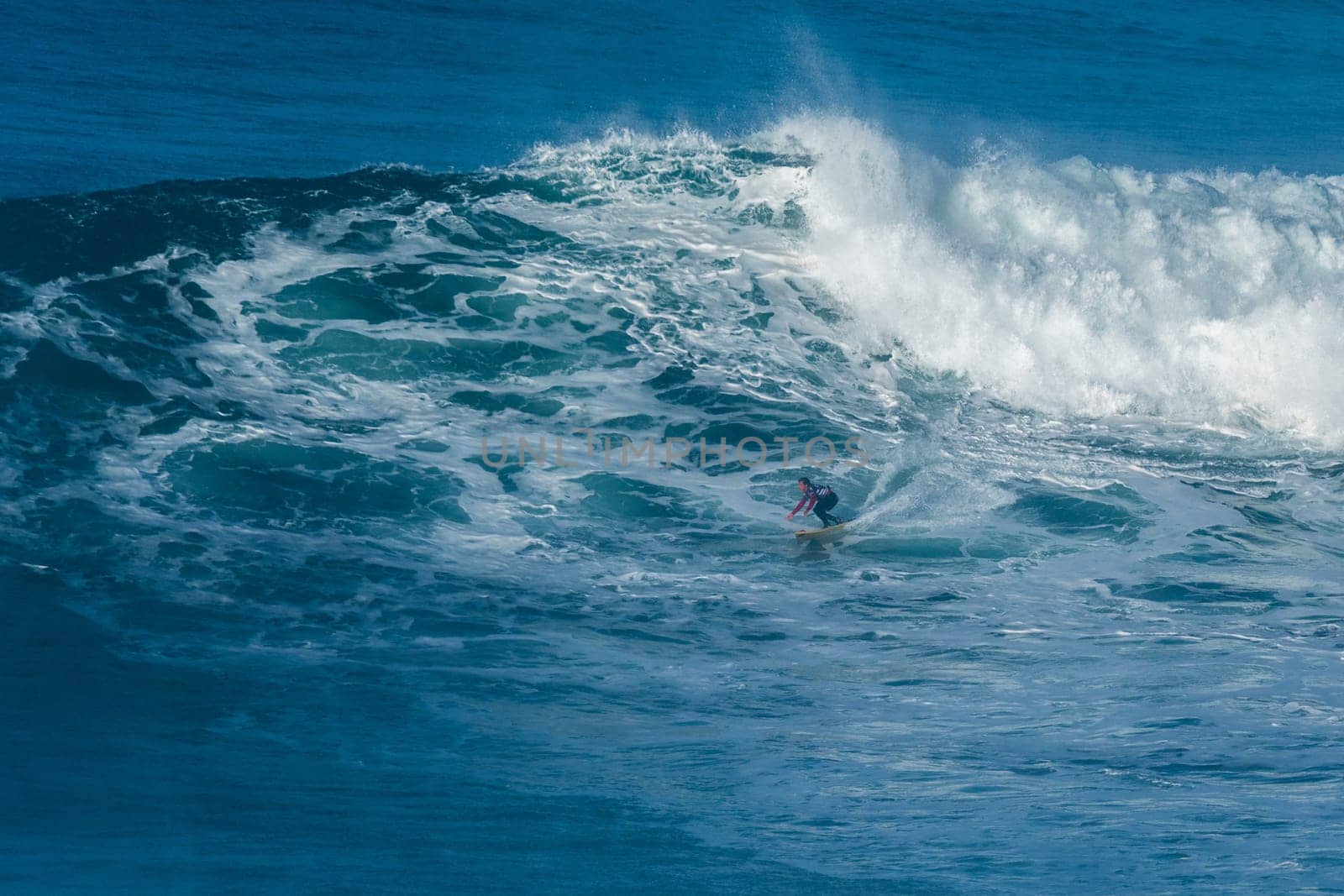 NAZARE, PORTUGAL - DECEMBER 20, 2016: Kai Lenny (HAW) during the Nazare Challenge 2016 - Big Wave Tour #3 at Praia do Norte - Nazare, Portugal.