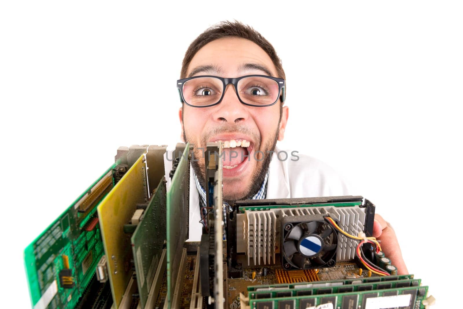 Nerd engineer posing with computer components isolated in a white background