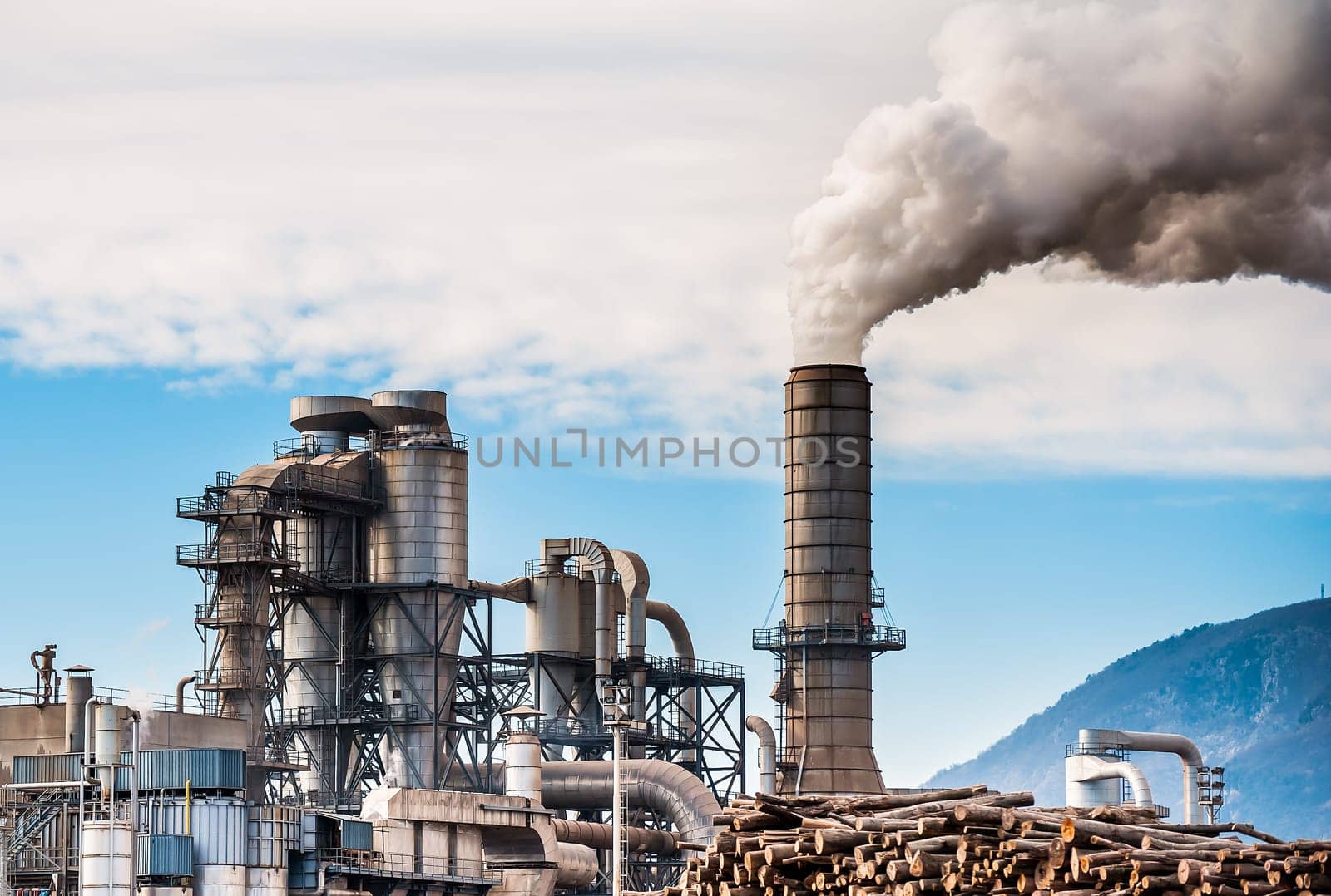Chemical plant for the processing of chipboard and smokestack of a furniture factory