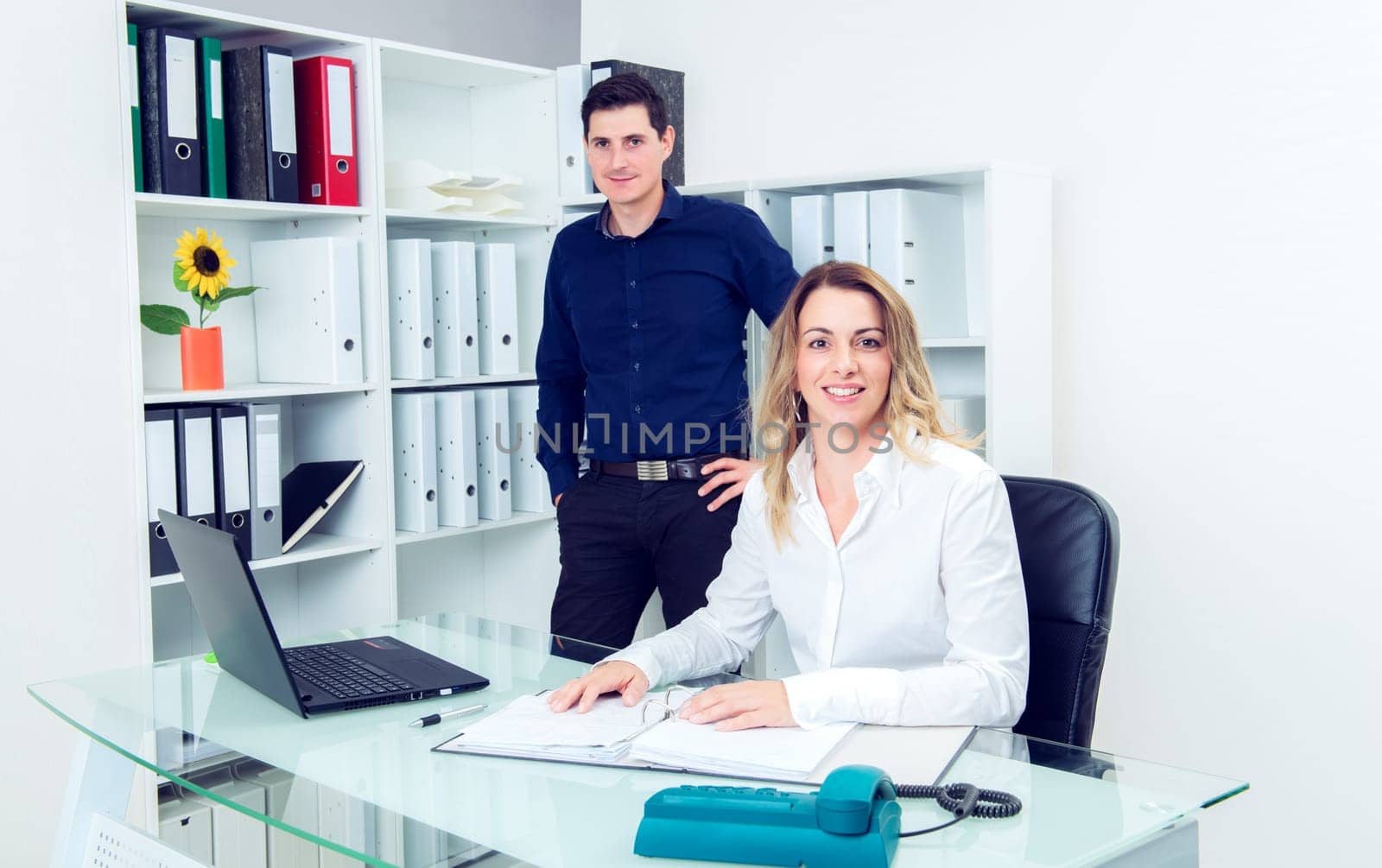 young businessman and businesswoman working together in the office