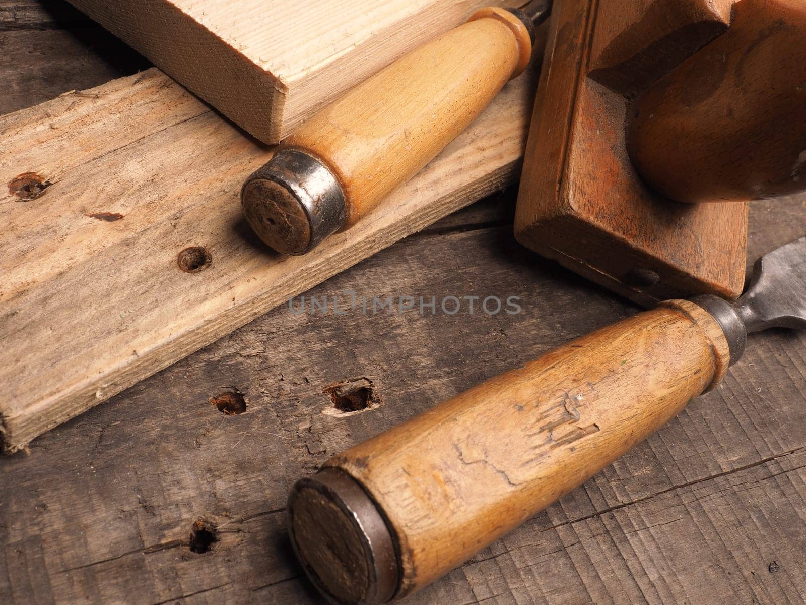 Wood worker tools on an old wooden table