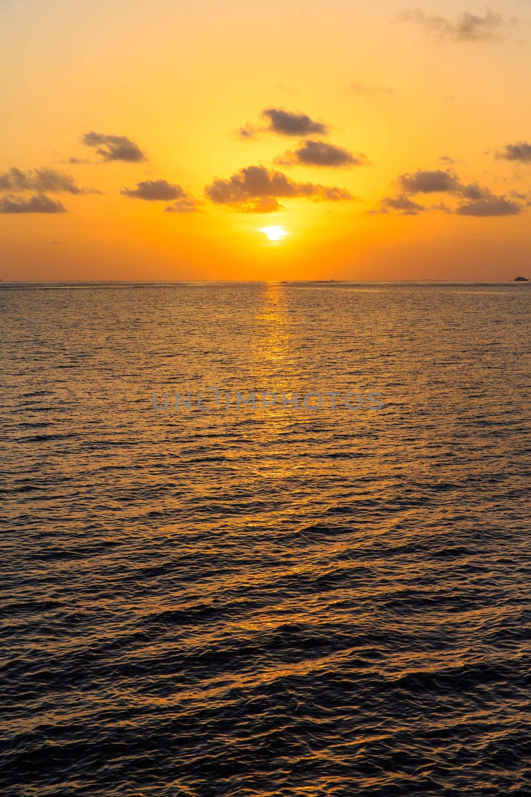 Sunset on sea in Maldives..