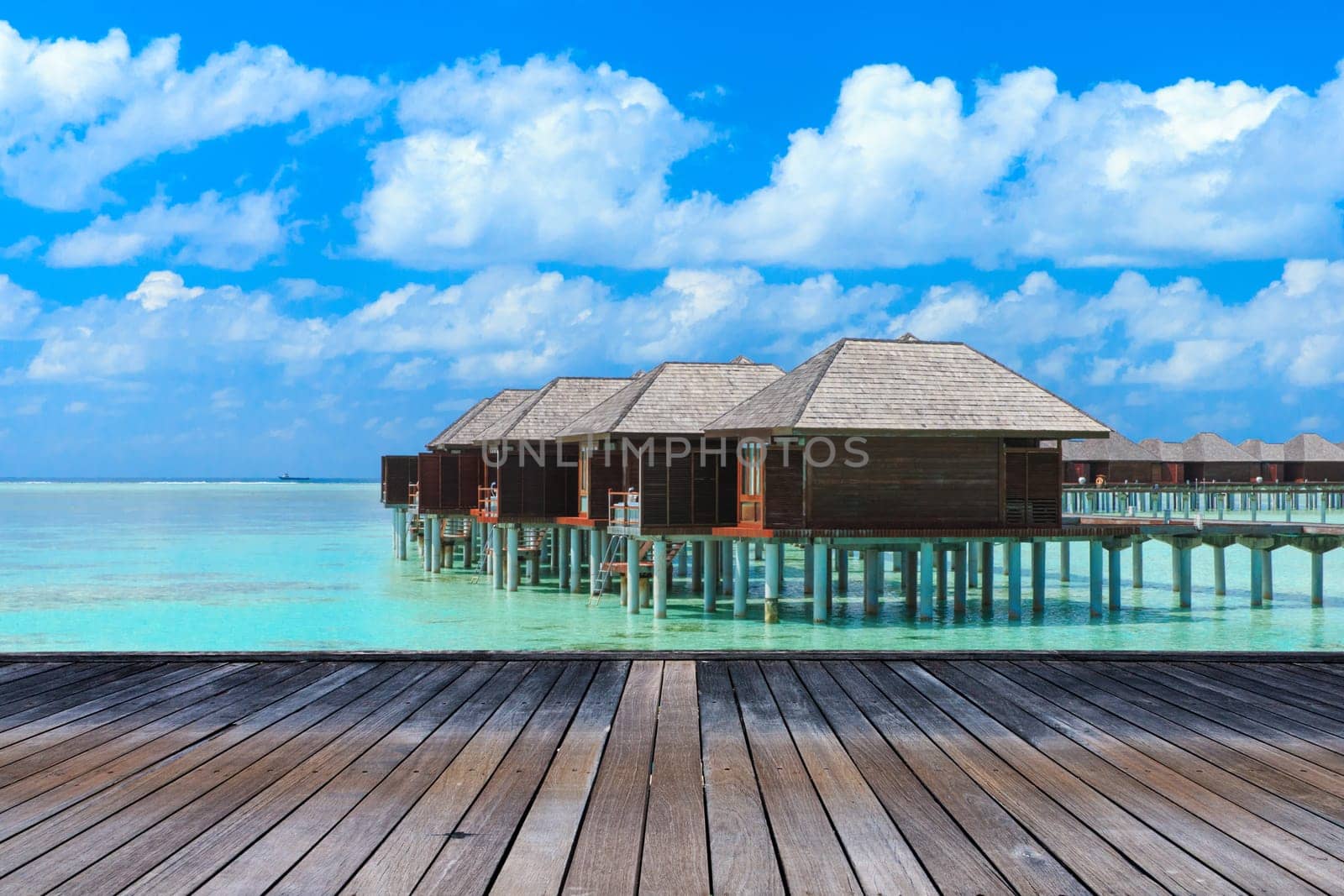 beach with water bungalows at Maldives..