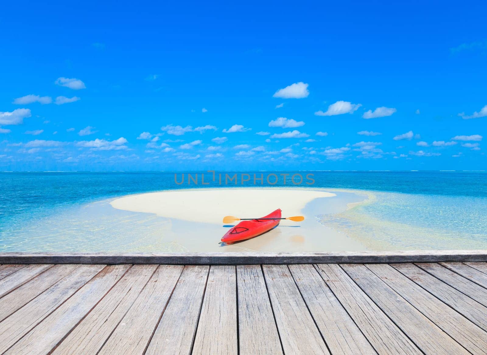 White tropical beach in Maldives with few palm trees and blue lagoon