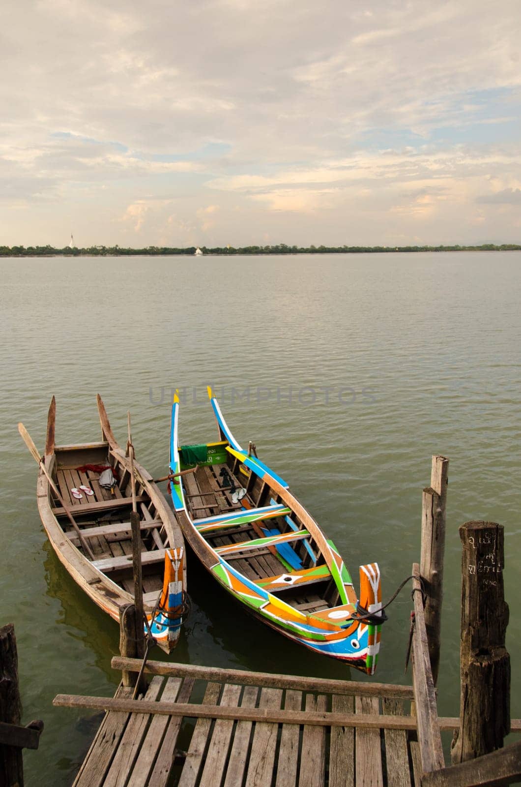 Boats docked at the Taung Tha Man Lake in Mandalay, Myanmar