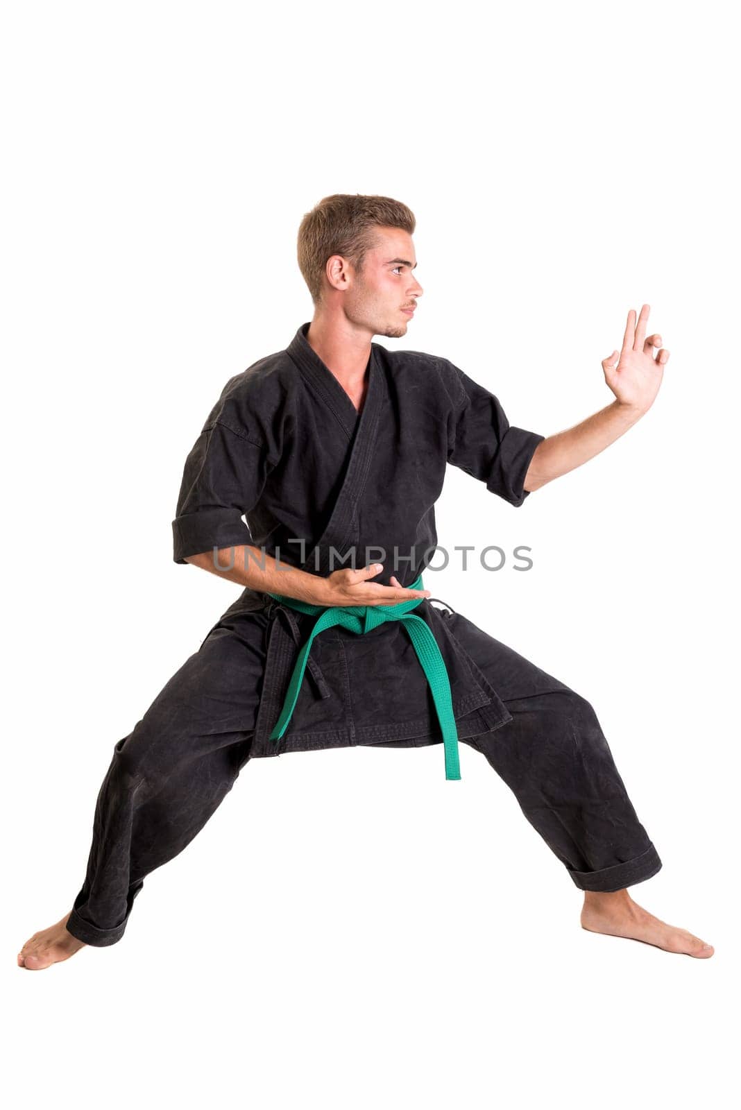 Martial arts student isolated in a white background